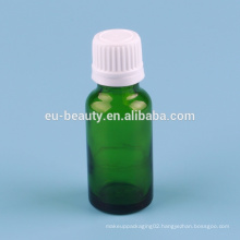 Green glass essential oil bottle white with reducer